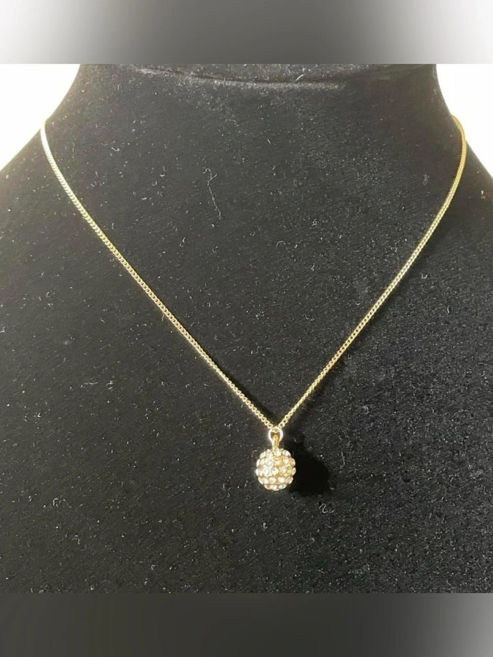 Golden ball rhinestone necklace.